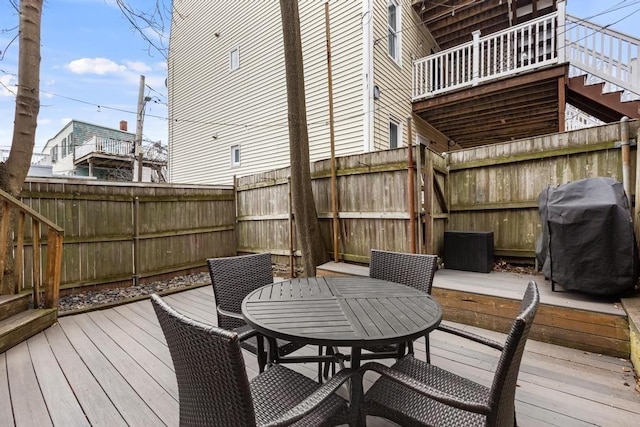 161 I St Unit 1, Boston, MA 02127 - deck featuring a grill, outdoor dining space, a fenced backyard, and stairway