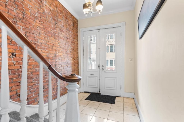 161 I St Unit 1, Boston, MA 02127 - entryway featuring light tile patterned flooring, brick wall, a chandelier, and ornamental molding
