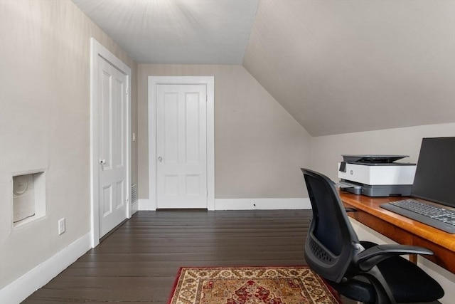 office space with lofted ceiling, wood finished floors, and baseboards