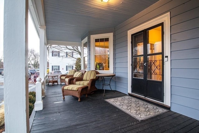 deck with covered porch