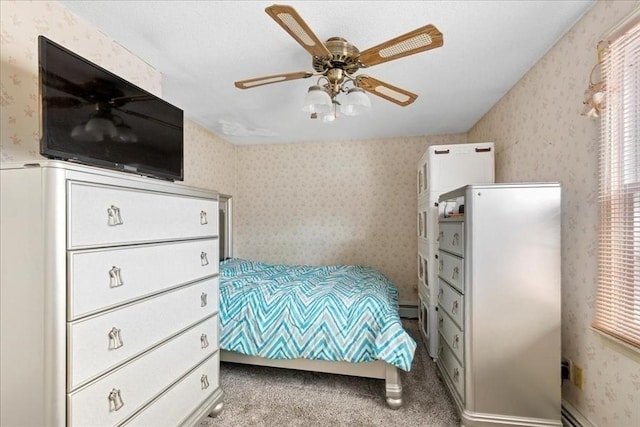 23 Vincent Cir, Worcester, MA 01604 - bedroom featuring wallpapered walls, a baseboard radiator, carpet, and a ceiling fan