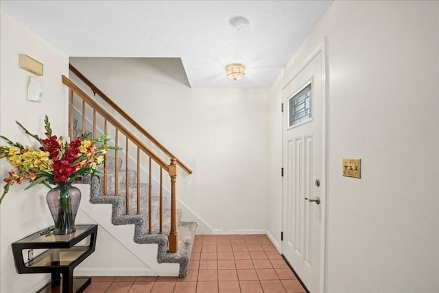 23 Vincent Cir, Worcester, MA 01604 - entryway featuring stairs, tile patterned floors, and baseboards