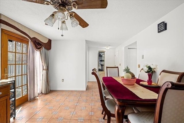 23 Vincent Cir, Worcester, MA 01604 - dining area featuring a ceiling fan, light tile patterned floors, baseboards, and a textured ceiling