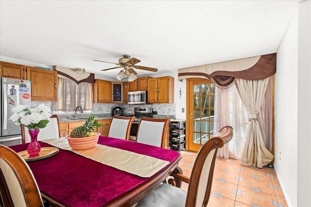 23 Vincent Cir, Worcester, MA 01604 - dining room with light tile patterned flooring, baseboards, and a ceiling fan