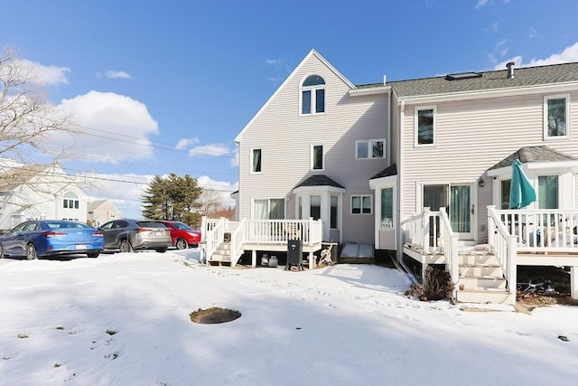 view of snow covered house