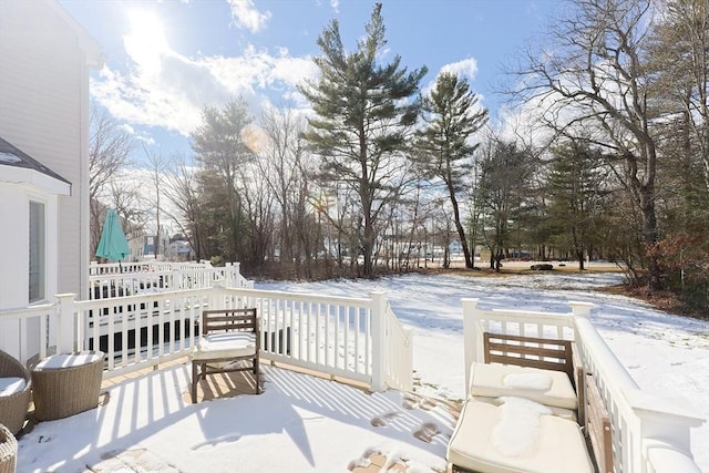 view of snow covered deck