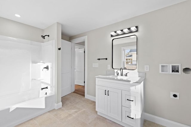 bathroom featuring vanity, shower / bath combination, and tile patterned flooring