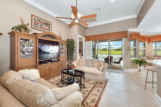 10852 Tiberio Dr, Fort Myers, FL 33913 - living room with baseboards, light tile patterned floors, a ceiling fan, crown molding, and visible vents