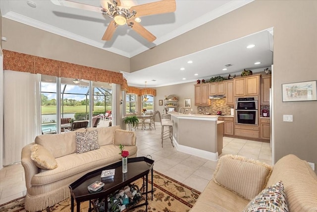 10852 Tiberio Dr, Fort Myers, FL 33913 - living area with recessed lighting, light tile patterned floors, ornamental molding, and ceiling fan