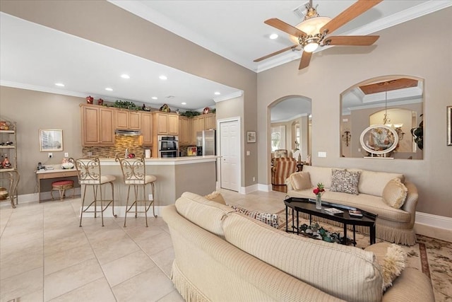 10852 Tiberio Dr, Fort Myers, FL 33913 - living area with ornamental molding, recessed lighting, and arched walkways