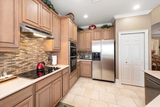 10852 Tiberio Dr, Fort Myers, FL 33913 - kitchen featuring tasteful backsplash, ornamental molding, under cabinet range hood, light countertops, and stainless steel appliances