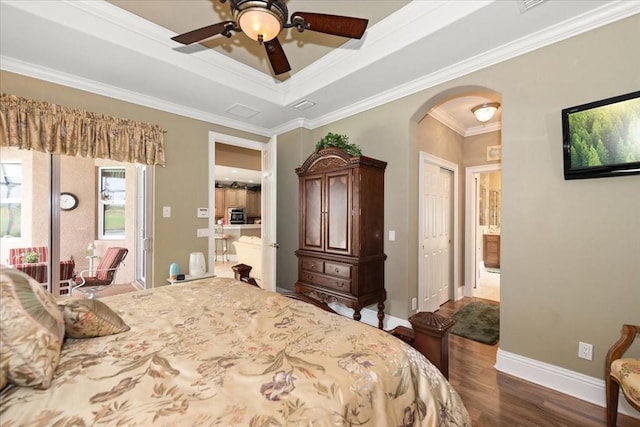 10852 Tiberio Dr, Fort Myers, FL 33913 - bedroom featuring ornamental molding, baseboards, arched walkways, and dark wood finished floors