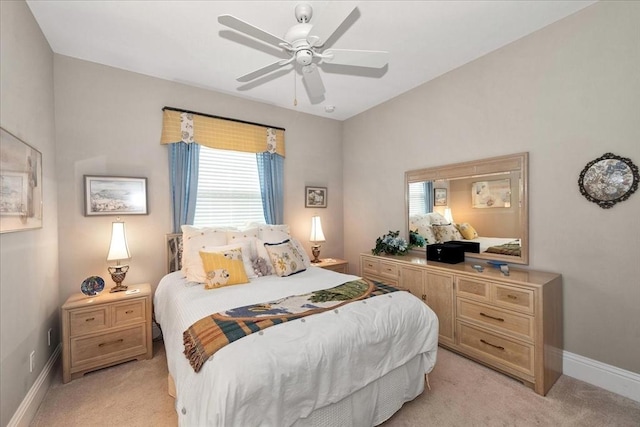 10852 Tiberio Dr, Fort Myers, FL 33913 - bedroom with baseboards, multiple windows, and light carpet