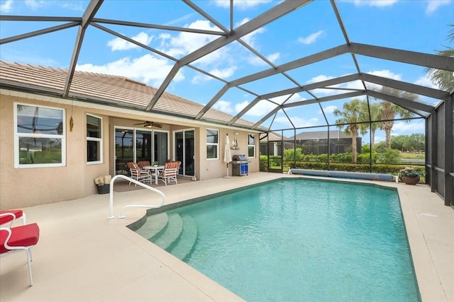 10852 Tiberio Dr, Fort Myers, FL 33913 - view of swimming pool featuring a patio, a covered pool, area for grilling, ceiling fan, and glass enclosure