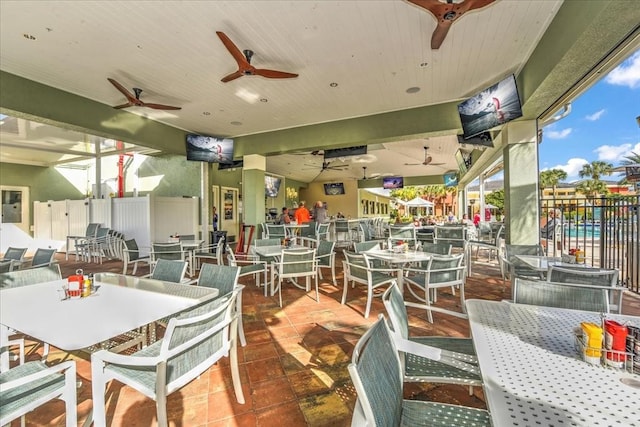 10852 Tiberio Dr, Fort Myers, FL 33913 - dining space featuring wood ceiling and ceiling fan