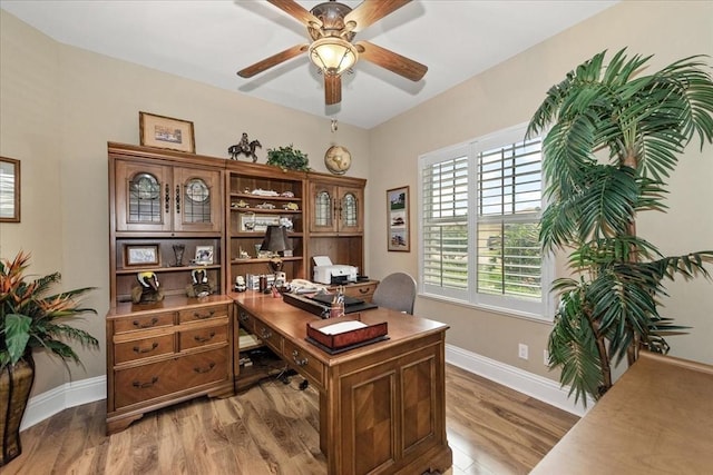 10852 Tiberio Dr, Fort Myers, FL 33913 - office area featuring light wood finished floors, baseboards, and ceiling fan