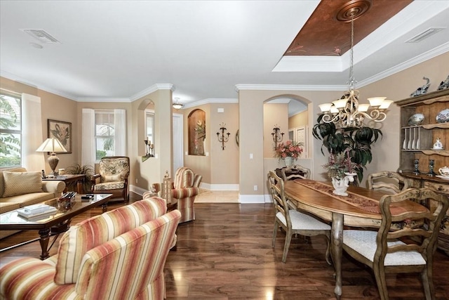 10852 Tiberio Dr, Fort Myers, FL 33913 - dining space with a chandelier, arched walkways, visible vents, and baseboards