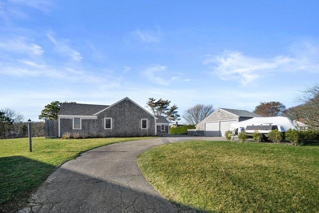 30 Captain Nickerson Ln, Dennis, MA 02660 - view of front of home with driveway and a front yard