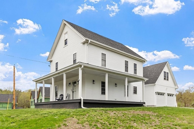 733 Massachusetts Ave, Lunenburg, MA 01462 - back of house featuring a porch, a lawn, and roof with shingles