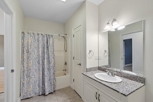 bathroom featuring shower / tub combo, tile patterned flooring, and vanity