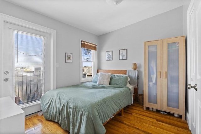 bedroom with wood finished floors