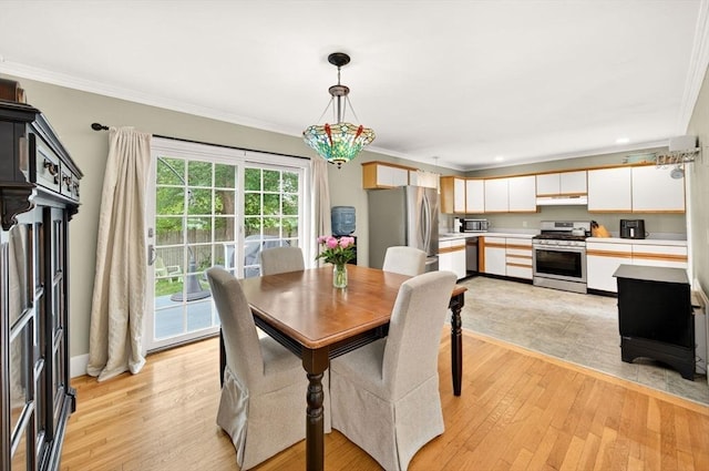 9 Arrowhead Ln, Dartmouth, MA 02748 - dining area featuring light wood-style flooring, ornamental molding, and recessed lighting