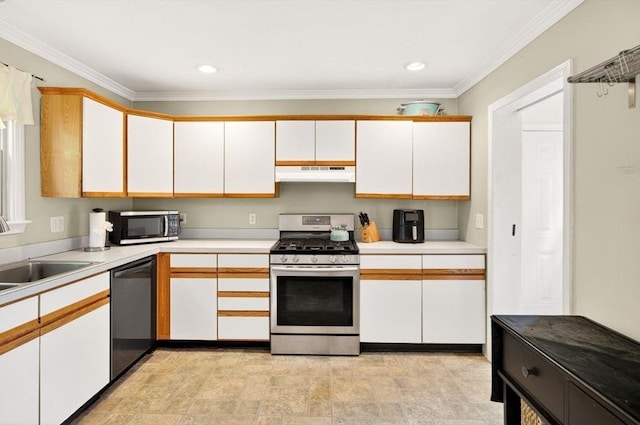 9 Arrowhead Ln, Dartmouth, MA 02748 - kitchen with stainless steel appliances, range hood, light countertops, white cabinets, and crown molding