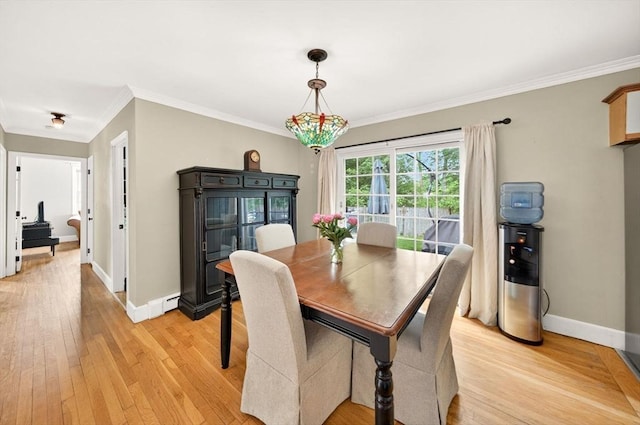9 Arrowhead Ln, Dartmouth, MA 02748 - dining room with light wood-type flooring and crown molding