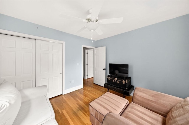 9 Arrowhead Ln, Dartmouth, MA 02748 - living area with light wood finished floors and a ceiling fan