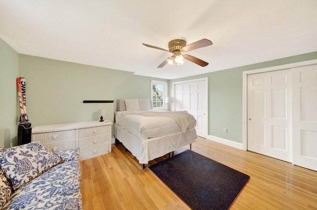 9 Arrowhead Ln, Dartmouth, MA 02748 - bedroom with two closets, wood finished floors, and ceiling fan
