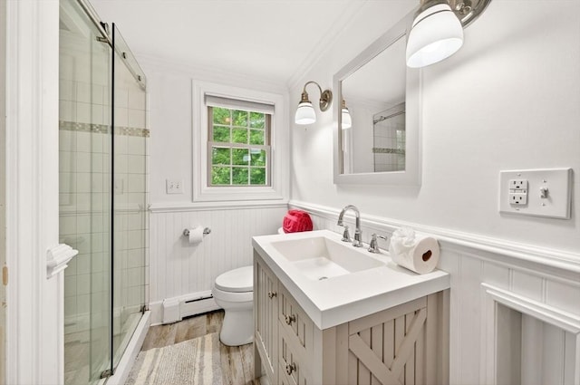 9 Arrowhead Ln, Dartmouth, MA 02748 - full bath with a wainscoted wall, baseboard heating, vanity, a stall shower, and ornamental molding