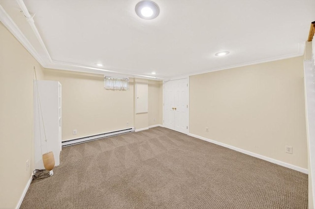 9 Arrowhead Ln, Dartmouth, MA 02748 - finished basement with a baseboard radiator, carpet floors, recessed lighting, and crown molding