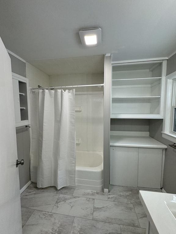 bathroom with shower / bathtub combination with curtain and vanity