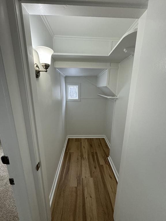 spacious closet featuring hardwood / wood-style floors