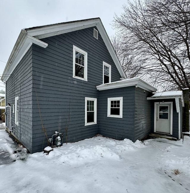 view of snow covered property