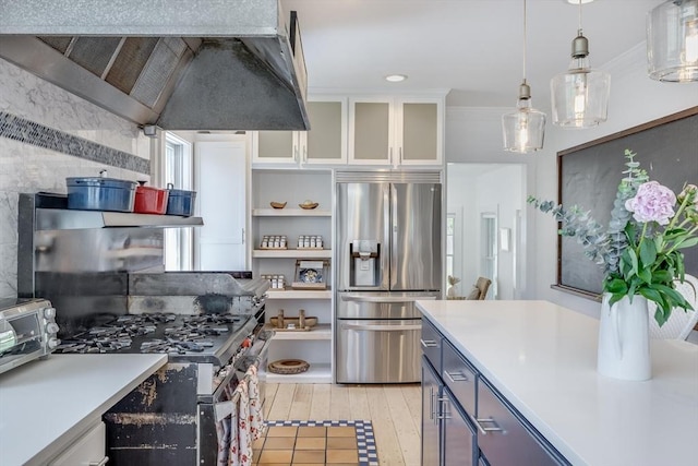 72 Oliver Snow Rd, Harwich, MA 02646 - kitchen featuring appliances with stainless steel finishes, white cabinetry, light countertops, open shelves, and hanging light fixtures