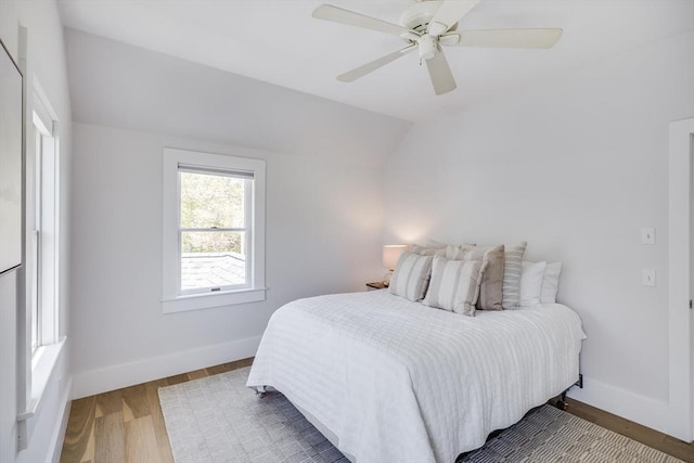 72 Oliver Snow Rd, Harwich, MA 02646 - bedroom with lofted ceiling, baseboards, wood finished floors, and ceiling fan