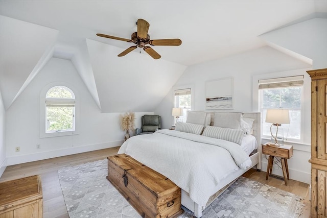 72 Oliver Snow Rd, Harwich, MA 02646 - bedroom with vaulted ceiling, light wood-type flooring, baseboards, and a ceiling fan