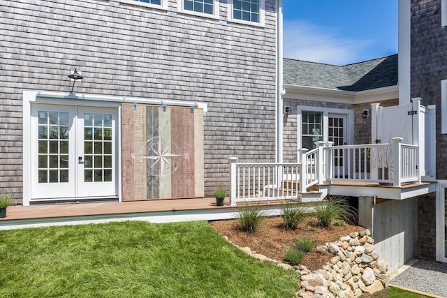 72 Oliver Snow Rd, Harwich, MA 02646 - view of exterior entry with french doors and a shingled roof