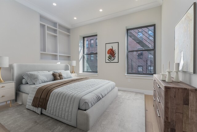 bedroom with light hardwood / wood-style floors