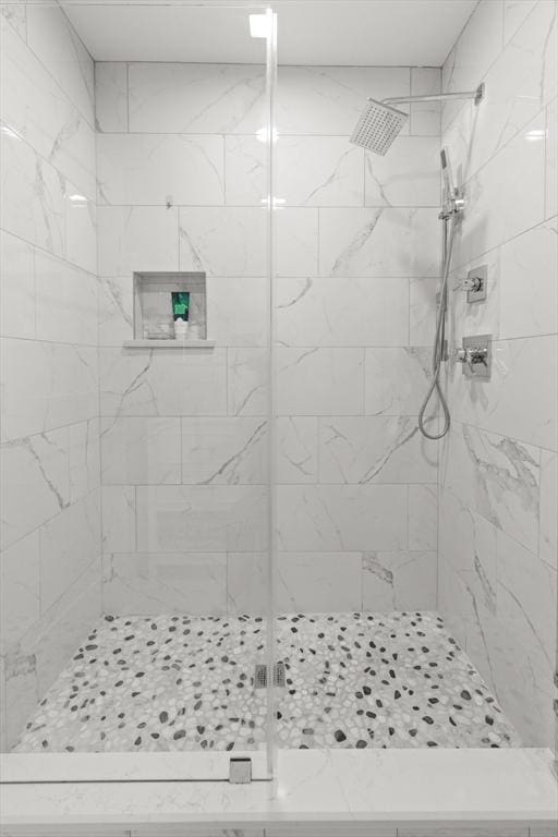 bathroom with a stall shower