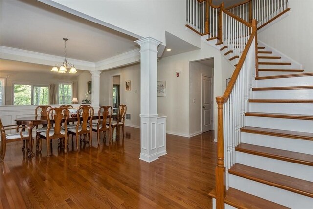 25 Kelly Way Unit 25, Canton, MA 02021 - stairs featuring wood finished floors, decorative columns, crown molding, baseboards, and a chandelier
