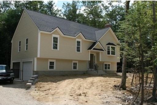 bi-level home featuring a garage