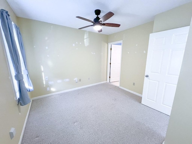 23 Hobart Ln Unit 23, Rockland, MA 02370 - unfurnished bedroom with carpet floors, baseboards, multiple windows, and ceiling fan