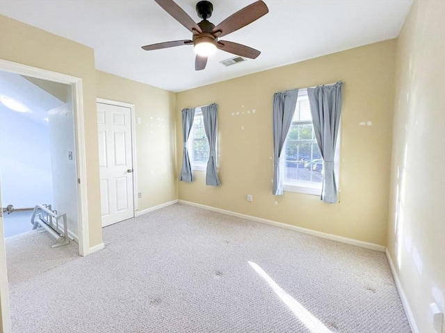 23 Hobart Ln Unit 23, Rockland, MA 02370 - unfurnished bedroom featuring carpet floors, baseboards, and ceiling fan
