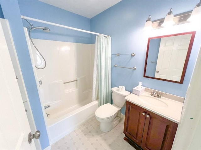 23 Hobart Ln Unit 23, Rockland, MA 02370 - bathroom with shower / bath combo with shower curtain, toilet, vanity, and tile patterned floors