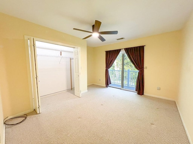 23 Hobart Ln Unit 23, Rockland, MA 02370 - unfurnished bedroom with access to outside, light colored carpet, a closet, and baseboards
