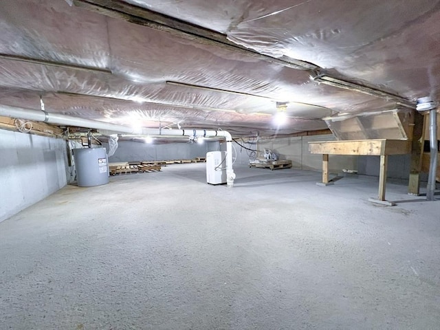 23 Hobart Ln Unit 23, Rockland, MA 02370 - unfinished basement featuring electric water heater