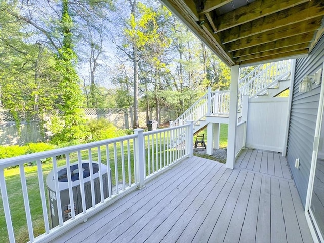 23 Hobart Ln Unit 23, Rockland, MA 02370 - deck featuring stairs and view of wooded area