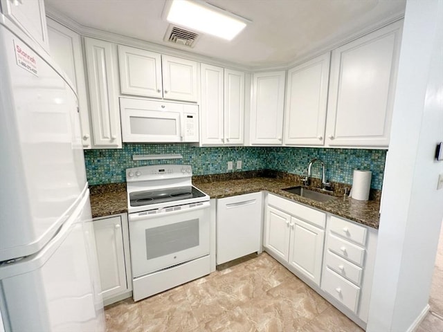 23 Hobart Ln Unit 23, Rockland, MA 02370 - kitchen featuring white appliances, a sink, white cabinetry, and backsplash